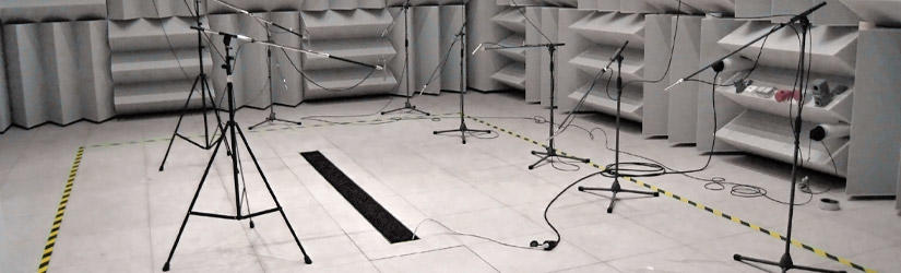 Experimental setup in the sound-chamber with built-in fan coil in the entrance area, microphones were placed in front of it